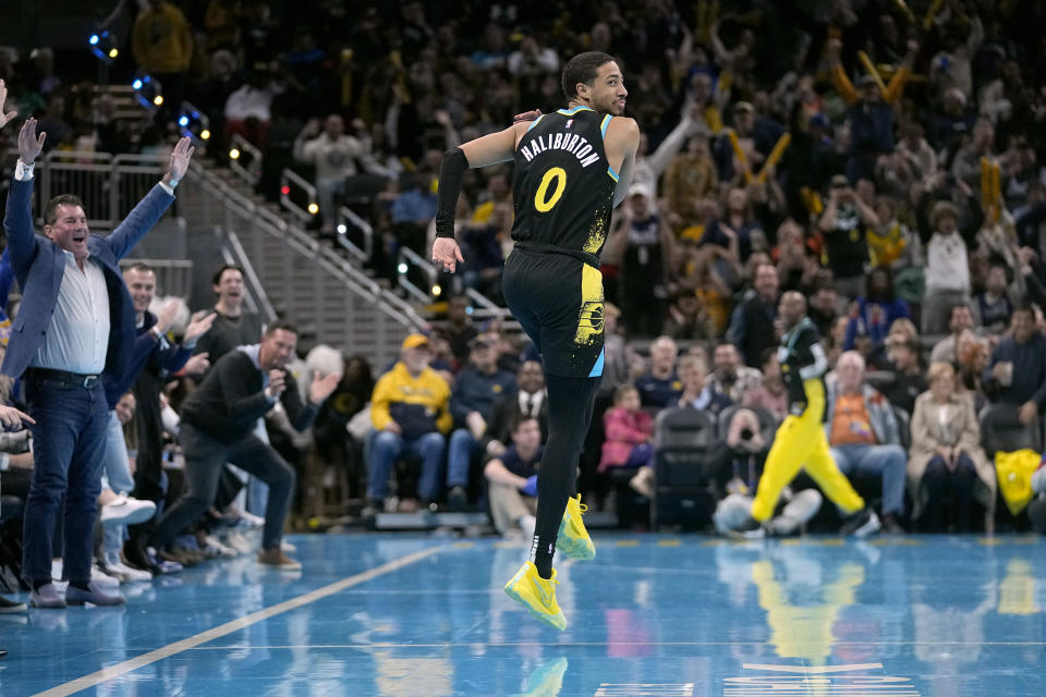 Indiana Pacers' Tyrese Haliburton celebrates after hitting a three point shot during the first half on an NBA In-Season Tournament basketball game against the Detroit Pistons, Friday, Nov. 24, 2023, in Indianapolis. (AP Photo/Darron Cummings)