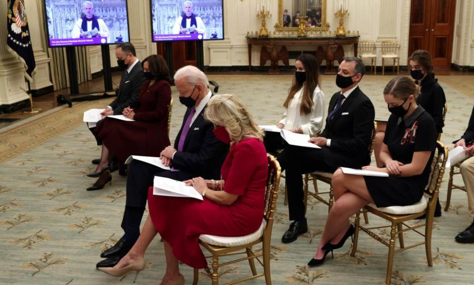 Joe Biden, Kamala Harris and their families take part virtually in an interfaith service held at the National Cathedral in Washington.