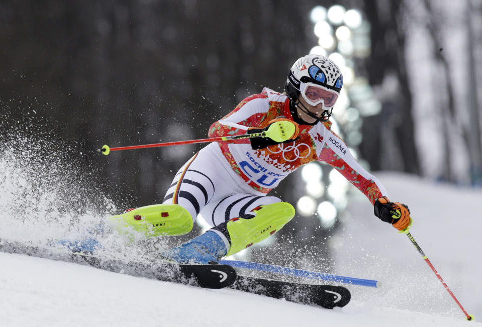 Germany's Maria Hoefl-Riesch skis to the gold medal in the women's supercombined in the Sochi 2014 Winter Olympics, Monday, Feb. 10, 2014, in Krasnaya Polyana, Russia. (AP Photo/Luca Bruno)