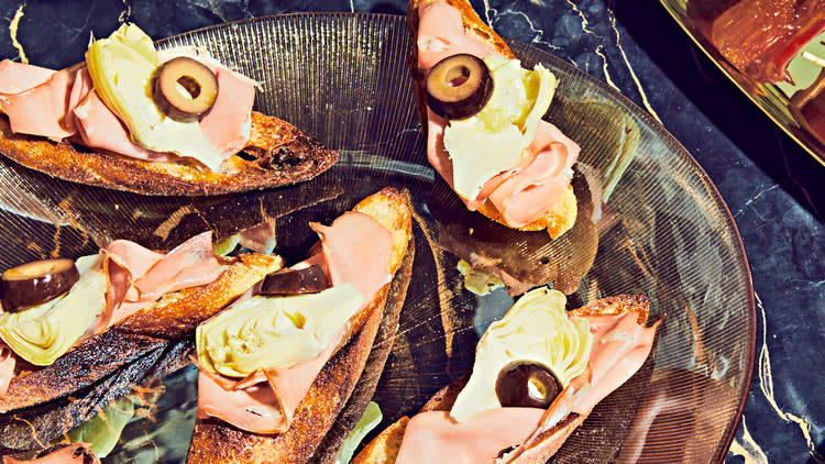 Mortadella, Artichoke-Heart, and Olive Crostini