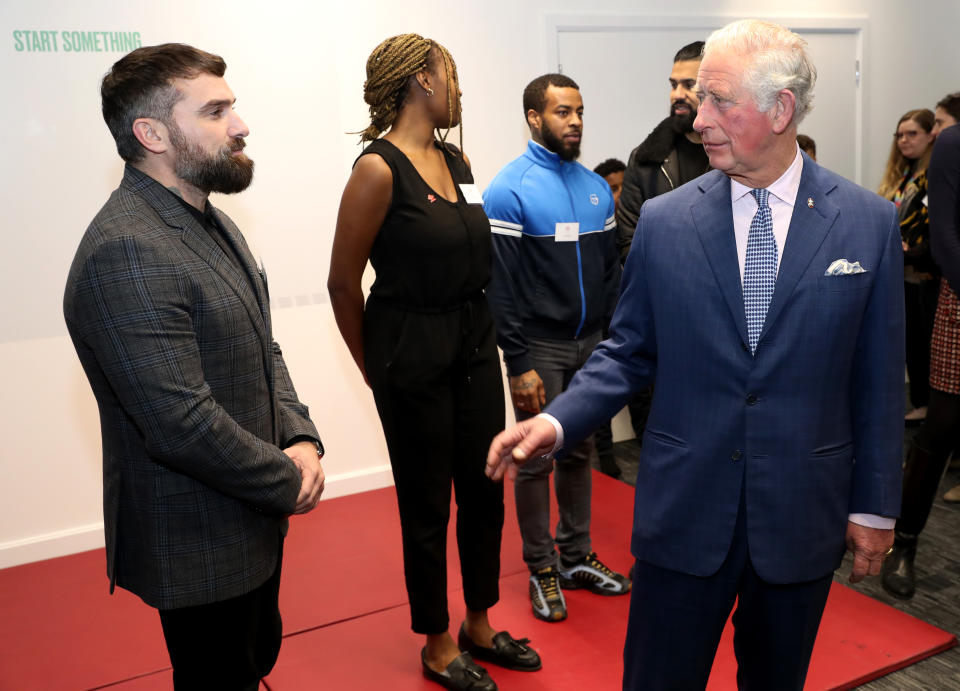 The Prince of Wales speaks with Ant Middleton (left) during the opening of the Prince's Trust charity's new south London centre in Southwark.