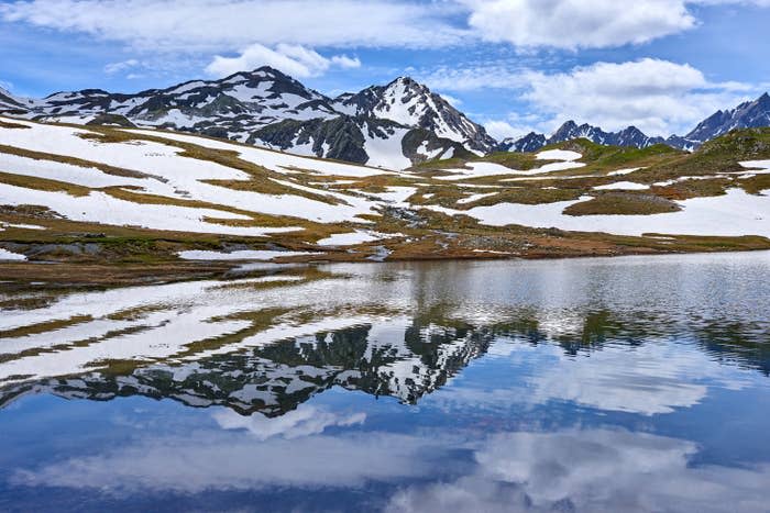 The alps reflected in a lake.