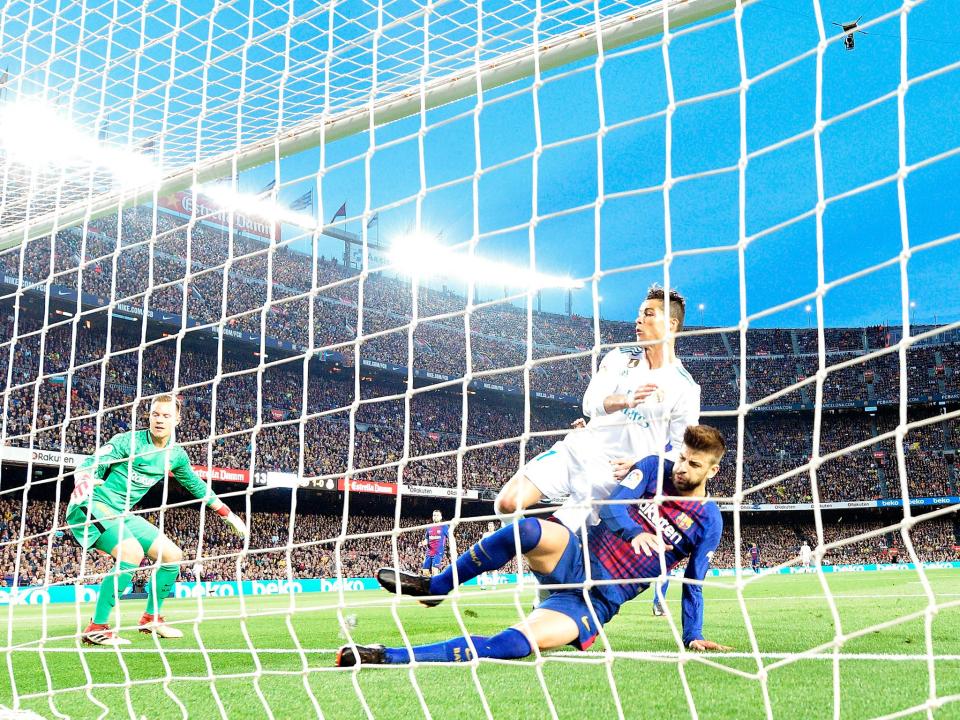 Ronaldo, pictured scoring against Barcelona at the weekend, has never won a World Cup: Getty