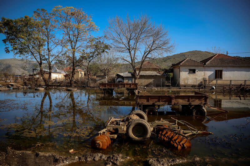 FILE PHOTO: View of still-flooded agriculture equipment in Greek village of Vlohos