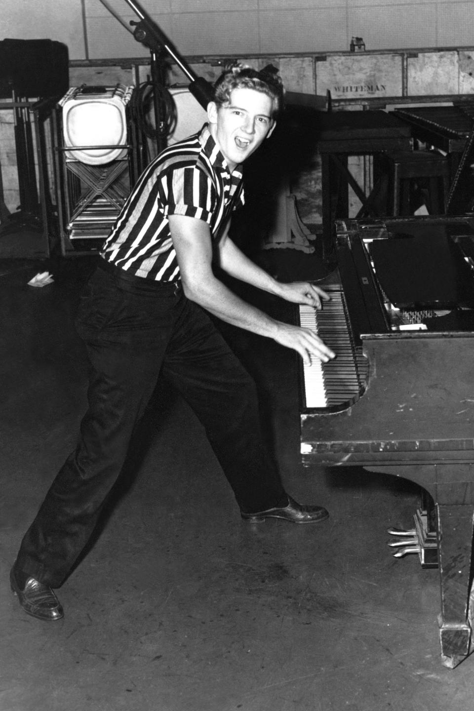 Jerry Lee Lewis performs in Memphis, circa 1957.  / Credit: Michael Ochs Archives/Getty Images