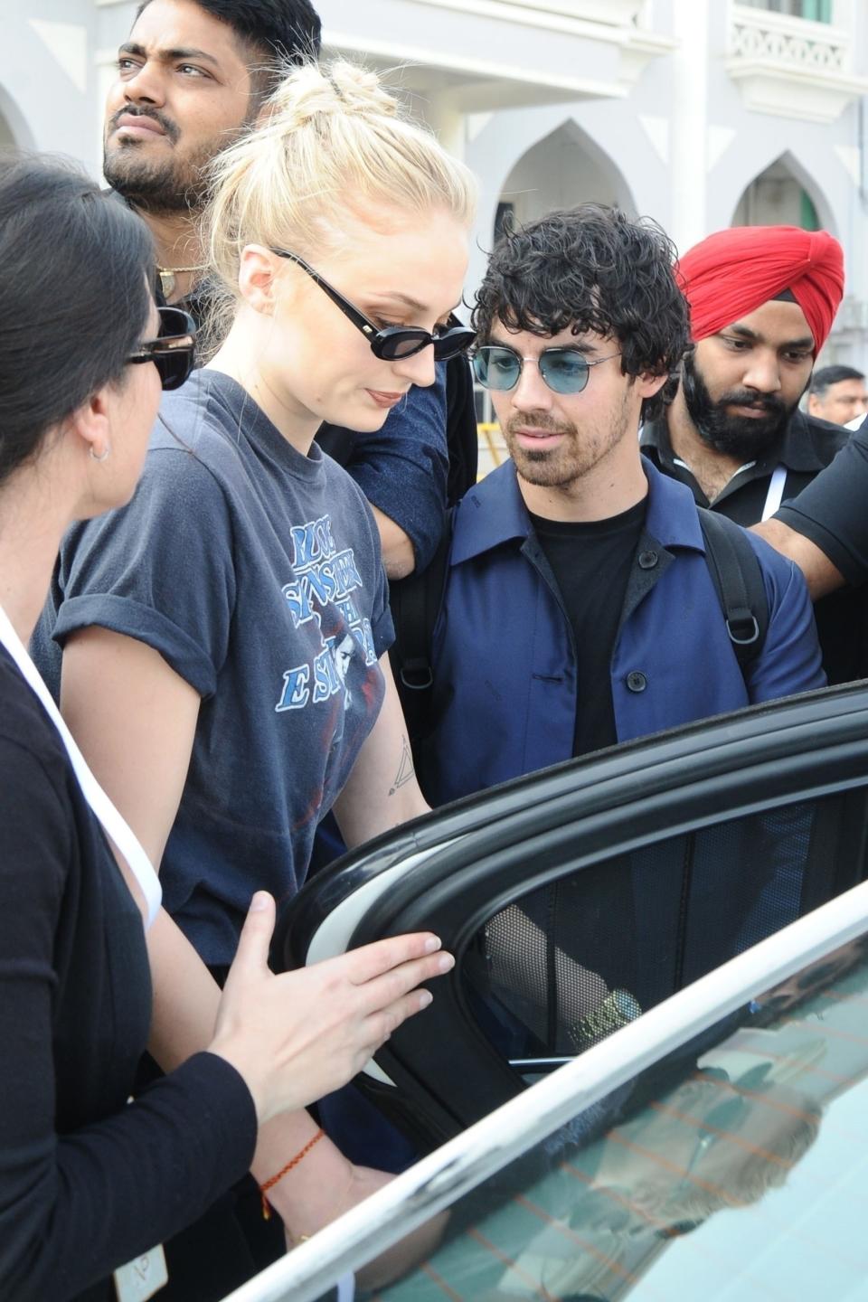 Priyanka Chopra, Nick Jonas, and guests Sophie Turner, Joe Jonas, Kevin Jonas, and Danielle Jonas arrive in Jodhpur, India, for their wedding weekend.