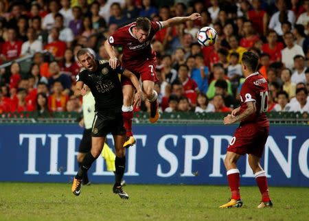 Soccer Football - Leicester City v Liverpool - Pre Season Friendly - The Premier League Asia Trophy - Final - June 22, 2017 Liverpool's James Milner in action with Leicester City's Islam Slimani REUTERS/BOBBY YIP