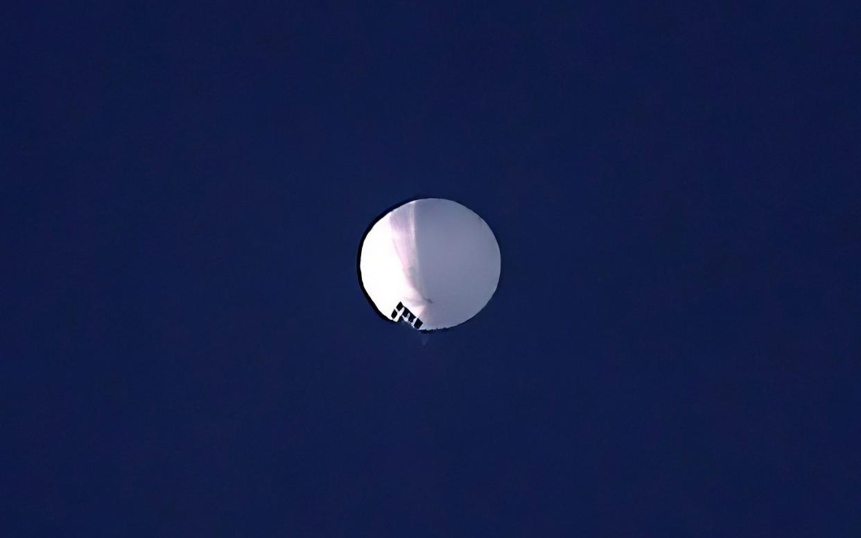 A suspected Chinese surveillance balloon flying over Billings, Montana - The Billings Gazette/AP