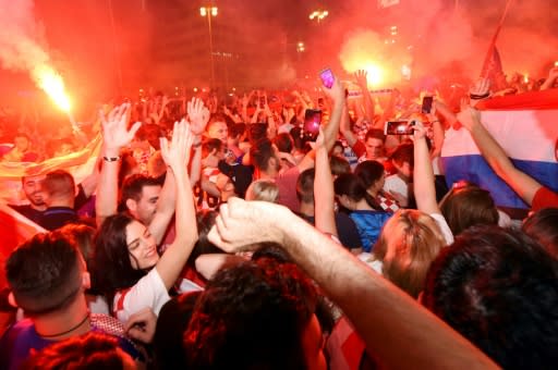 Croatia fans in Zagreb's main square celebrate their World Cup semi-final win over Russia