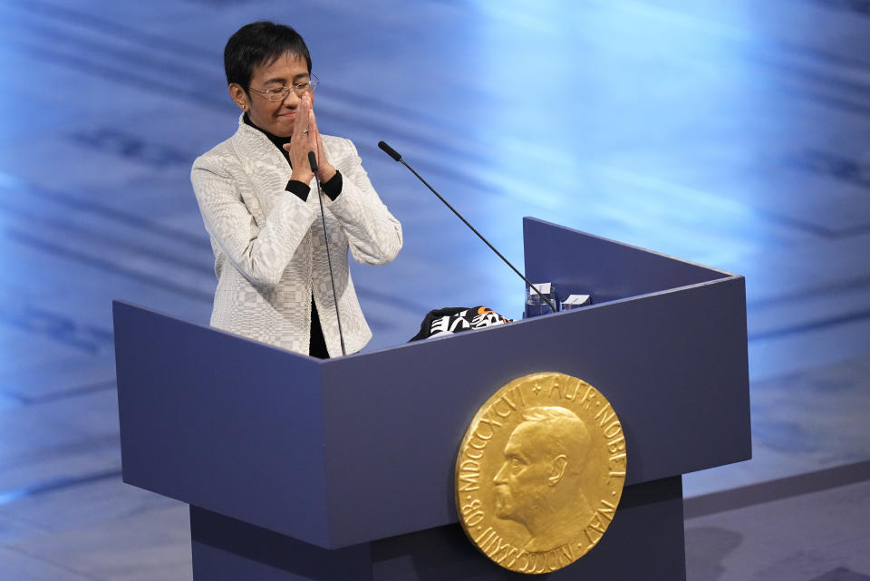 FILE - Nobel Peace Prize winner Maria Ressa of the Philippines gestures as she speaks during the Nobel Peace Prize ceremony at Oslo City Hall, Norway, Friday, Dec. 10, 2021. For the two journalists who won the Nobel Peace Prize in 2021, the past year has not been easy. Dmitry Muratov of Russia and Maria Ressa of the Philippines have been fighting for the survival of their news organizations, defying government efforts to silence them. (AP Photo/Alexander Zemlianichenko, File)