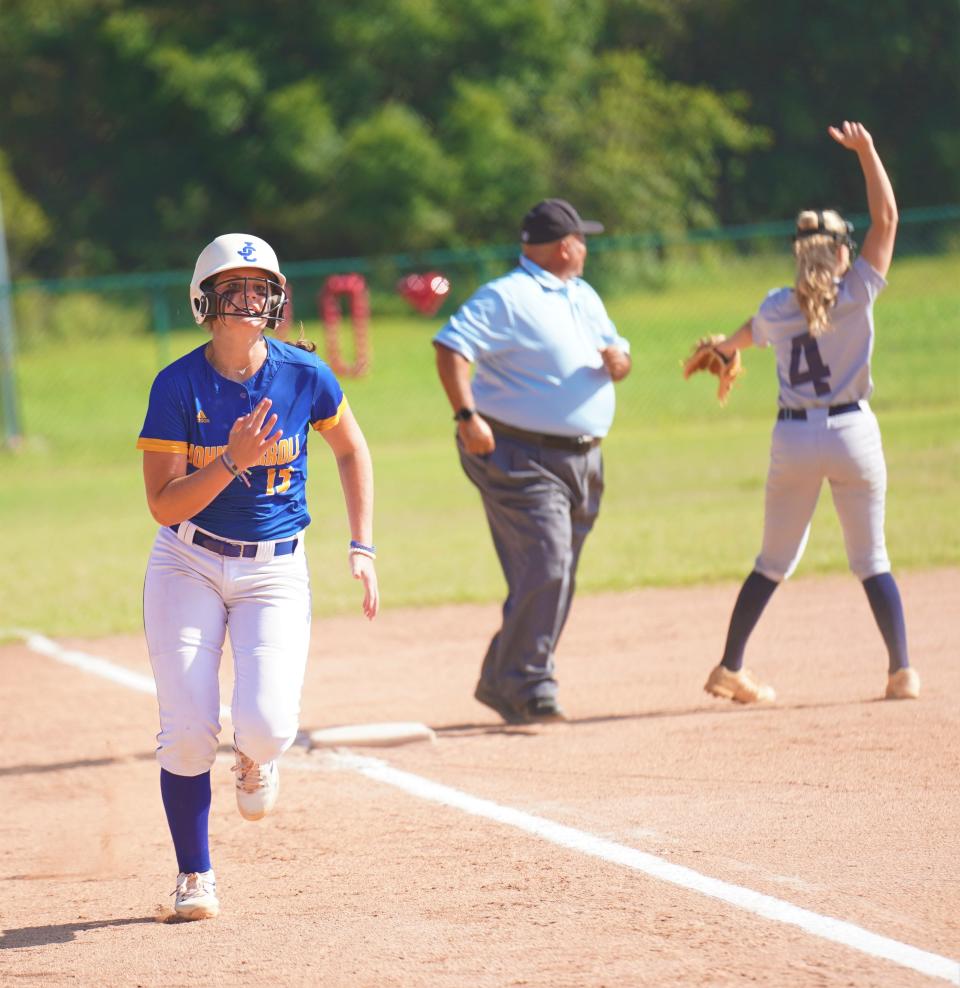 John Carroll Catholic's Sammi Rychter scores a run in the first inning of the District 13-2A softball championship game against Oxbridge Academy on Thursday, May 4, 2023 in Vero Beach.