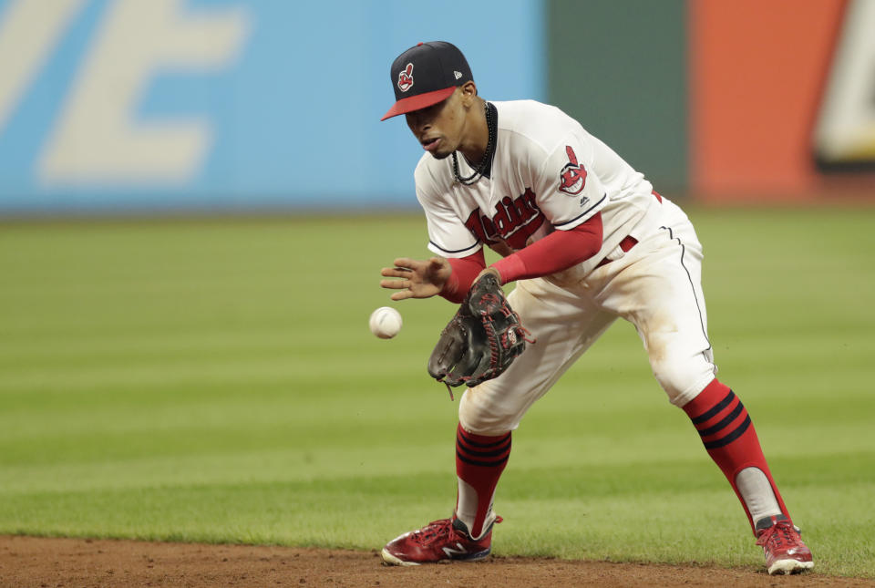 Cleveland Indians' Francisco Lindor fields a ball hit by Minnesota Twins' Eddie Rosario in the sixth inning of a baseball game, Monday, Aug. 6, 2018, in Cleveland. Rosario was out on the play. (AP Photo/Tony Dejak)