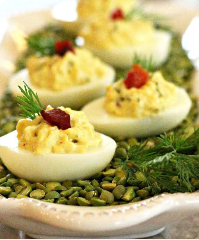 <p>Melissa's Southern Style Kitchen</p><p>Bacon Dill Deviled Eggs will make the bacon and eggs fans at your Thanksgiving table very happy. <a href="https://www.melissassouthernstylekitchen.com/bacon-dill-deviled-eggs/" rel="nofollow noopener" target="_blank" data-ylk="slk:Get the recipe here;elm:context_link;itc:0" class="link ">Get the recipe here</a>.</p>