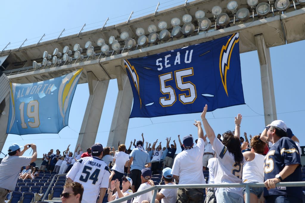 Sep 16, 2012; San Diego, CA, USA; San Diego Chargers fans as newly retired jersey of late Chargers linebacker Junior Seau is unveiled before a game against the Tennessee Titans at Qualcomm Stadium. Mandatory Credit: Jake Roth-USA TODAY Sports