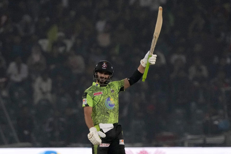 Lahore Qalandars' Sahibzada Farhan celebrates after scoring fifty during the Pakistan Super League T20 cricket match between Islamabad United and Lahore Qalandars, in Lahore, Pakistan Saturday, Feb. 17, 2024. (AP Photo/K.M. Chaudary)