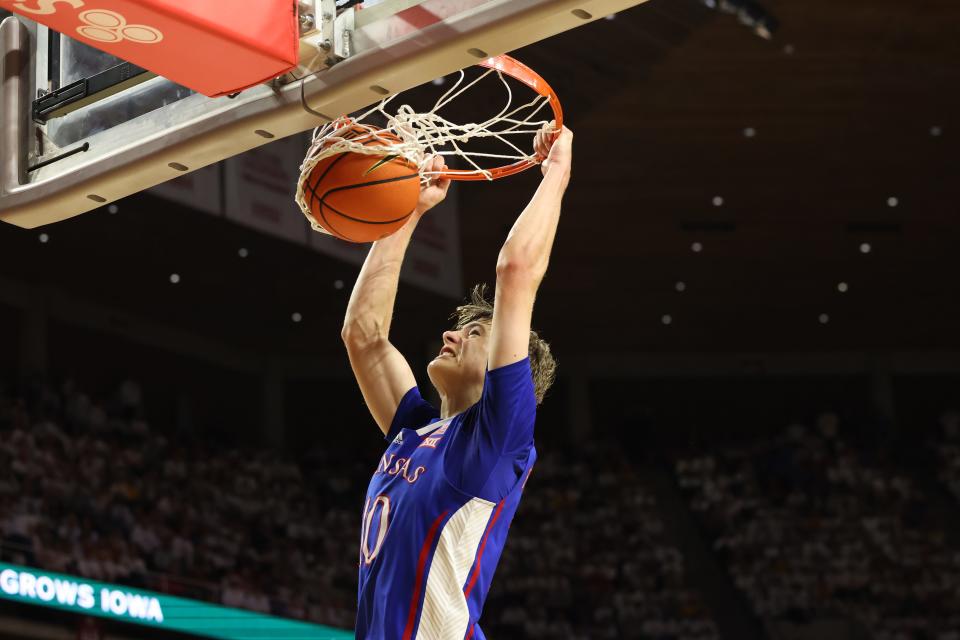 Feb 4, 2023; Ames, Iowa, USA; Kansas Jayhawks guard Johnny Furphy (10) dunks against the Iowa State Cyclones at James H. Hilton Coliseum. Mandatory Credit: Reese Strickland-USA TODAY Sports