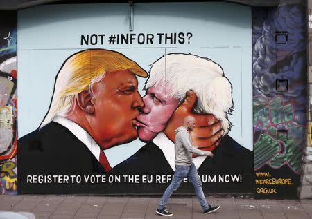 A mural of Donald Trump embracing Boris Johnson is seen on a building in Bristol, Britain May 24, 2016. REUTERS/Peter Nicholls