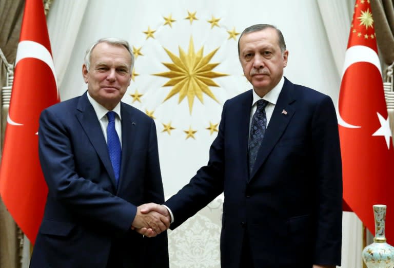 During a meeting with Turkish President Recep Tayyip Erdogan (R) in Ankara October 24, 2016, French Foriegn Minister Jean-Marc Ayrault expressed concern over the way the Turkish government is implementing its post-coup state of emergency