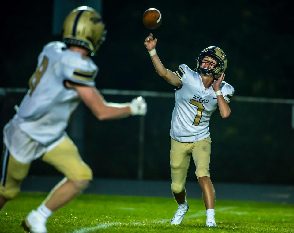 Hopewell QB Kingston Krotec throws to Cameron Fedorka during their game Friday at South Side High School [Lucy Schaly/For BCT]