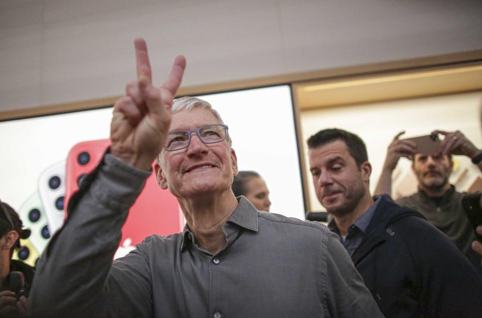 Apple CEO Tim Cook gestures after opening the newly renovated Apple Store at Fifth Avenue on September 20, 2019 in New York City. (Photo by Kena Betancur / AFP)        (Photo credit should read KENA BETANCUR/AFP/Getty Images)