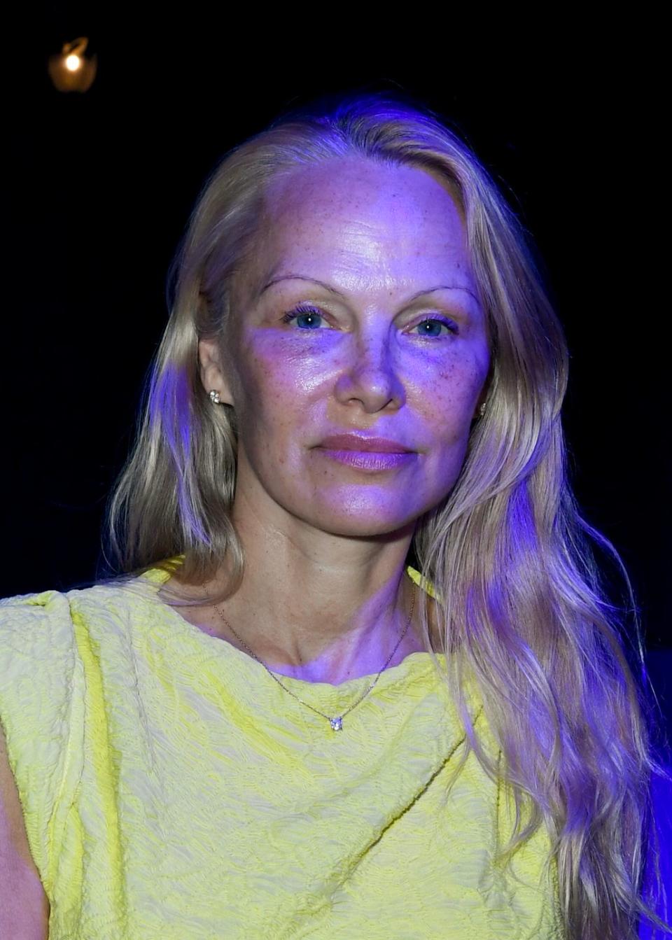 Pamela Anderson looks gorgeous going makeup-free at Paris Fashion Week