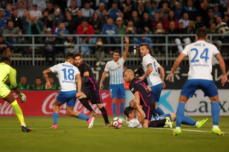 Football Soccer - Malaga v Barcelona- Spanish La Liga Santander - La Rosaleda Stadium, Malaga, Spain - 8/4/17 - Barcelona's Lionel Messi in action. REUTERS/Jon Nazca