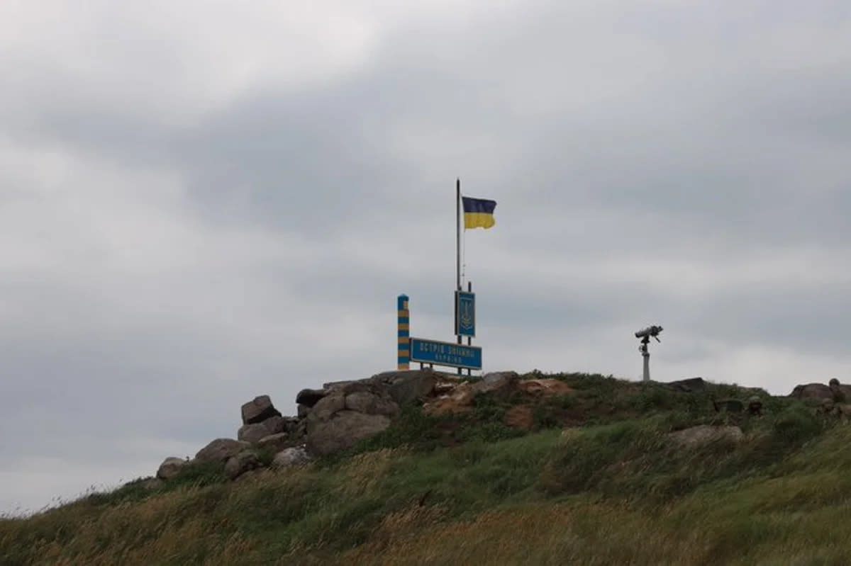 An image released by the Ukrainian military that it says shows the Ukrainian flag on Snake Island.  (DPSU Ukraine)