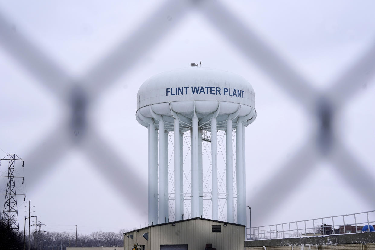 FILE - The Flint water plant tower is pictured on Jan. 6, 2022, in Flint, Mich. A judge dismissed criminal charges against former Michigan Gov. Rick Snyder in the Flint water crisis, months after the state Supreme Court said indictments returned by a one-person grand jury were invalid. (AP Photo/Carlos Osorio, File)