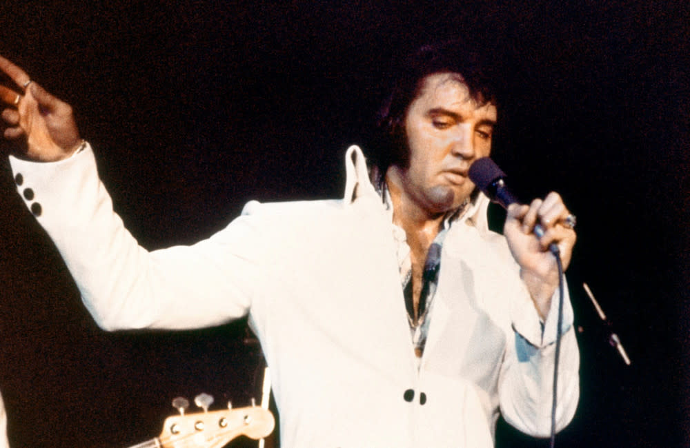 Elvis Presley - 1970s - on stage - Getty
