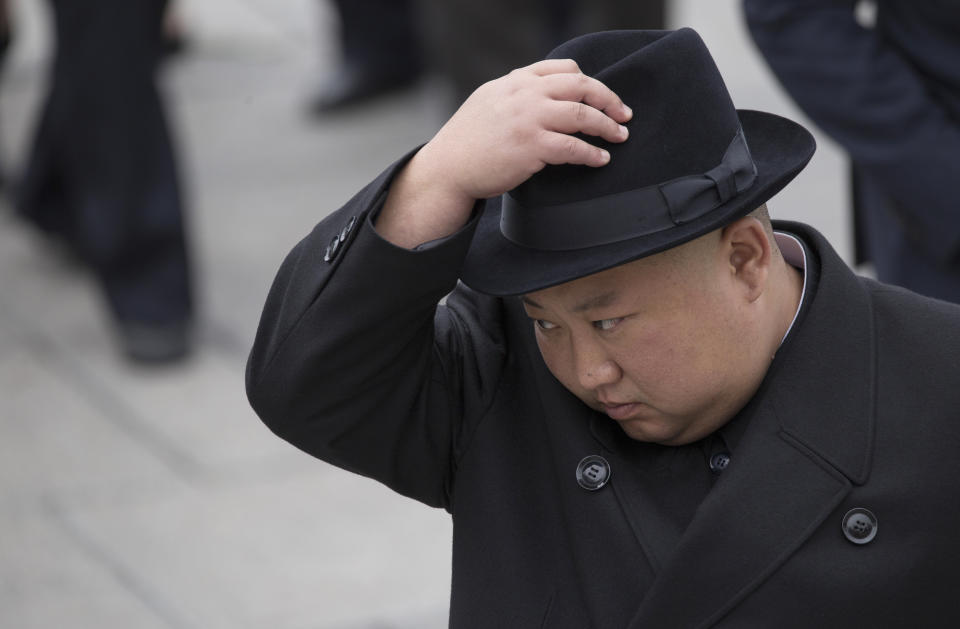 North Korean leader Kim Jong Un attends a wreath laying ceremony in Vladivostok, Russia, Friday, April 26, 2019. Kim paid his respects at a ceremony honoring the war dead Friday to wrap up a brief and generally successful visit to the Russian Far East for his first summit with President Vladimir Putin. (AP Photo/Alexander Khitrov)