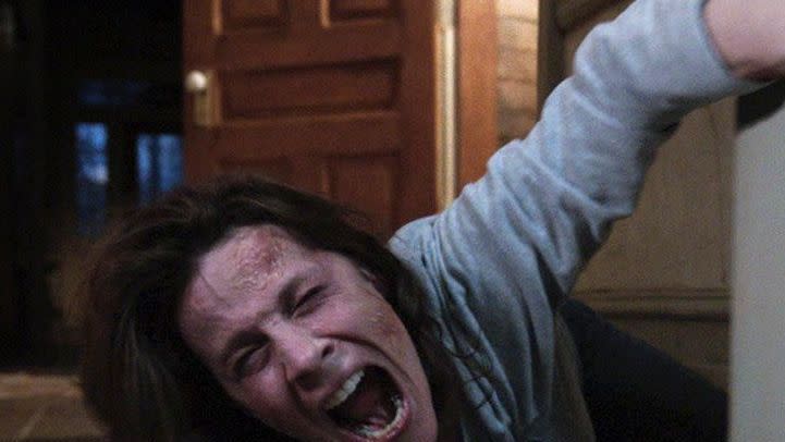 carolyn perron screams from the floor in a scene from the conjuring a good housekeeping pick for best halloween movies