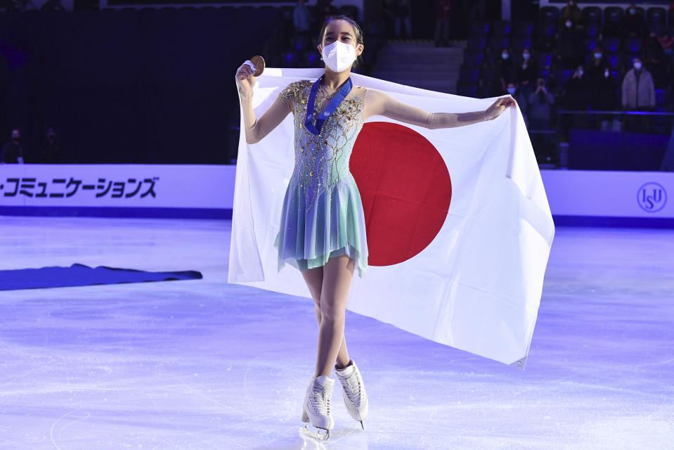 A winner Mai Mihara of Japan pose with her gold medal after the women free skating program during the ISU Four Continents Figure Skating Championships in Tallinn, Estonia, Saturday, Jan. 22, 2022. (AP Photo/Sergei Stepanov)