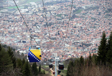The Trebevic cable car is seen above the city of Sarajevo during a test drive following the restoration of the line after 26 years, Bosnia and Herzegovina, April 4, 2018. Picture taken April 4, 2018. REUTERS/Dado Ruvic