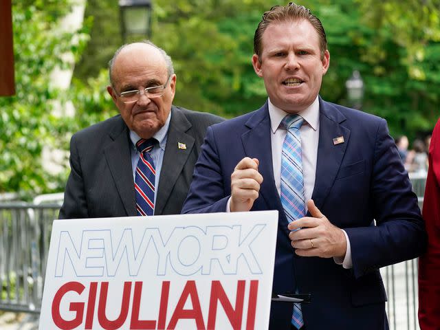 <p>Mary Altaffer/AP</p> Andrew Giuliani and Rudy Giuliani during a news conference on June 7, 2022