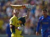 Australia's David Warner celebrates reaching his 100 during the Cricket World Cup match against Afghanistan on March 4, 2015