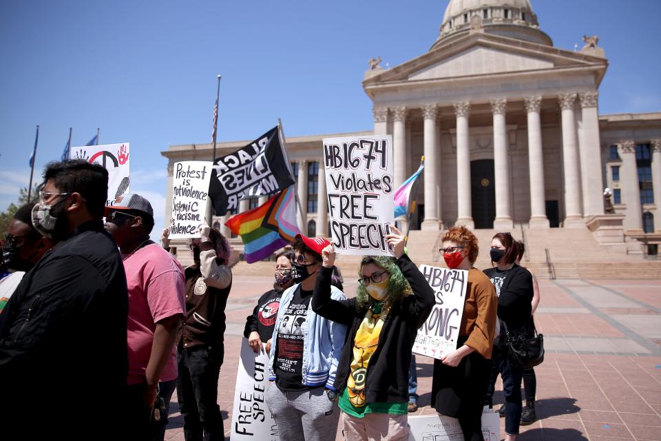A group of demonstrators speak to the media outside the state Capitol in Oklahoma City, Wednesday, April 21, 2021, while protesting recent bills passed by the Oklahoma Legislature.