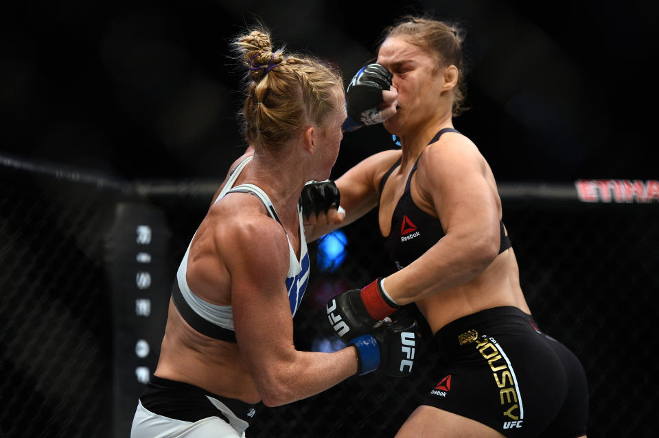 MELBOURNE, AUSTRALIA - NOVEMBER 15:  (L-R) Holly Holm punches Ronda Rousey in their UFC women's bantamweight championship bout during the UFC 193 event at Etihad Stadium on November 15, 2015 in Melbourne, Australia. (Photo by Jeff Bottari/Zuffa LLC/Zuffa LLC via Getty Images)