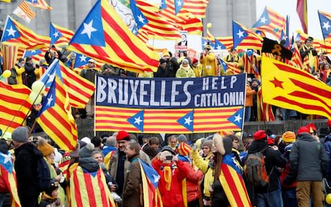 Pro-independence Catalans in a 2017 rally showing their support to ousted Catalan leader Carles Puigdemont - Credit: REUTERS/Yves Herman