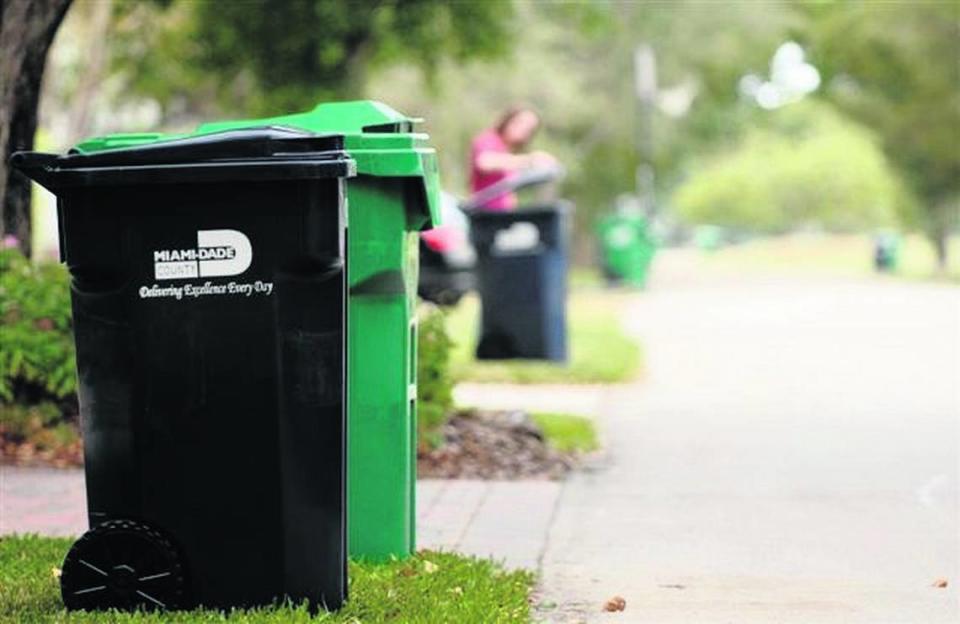 In Miami-Dade County, the big green bins are for all trash and garbage. The smaller bins are for clean, appropriate recyclable materials only -- such as paper, aluminum cans, cardboard and plastics that are marked with the triangular symbol and a number that is approved for recycling. No food containers or plastic bags, please.