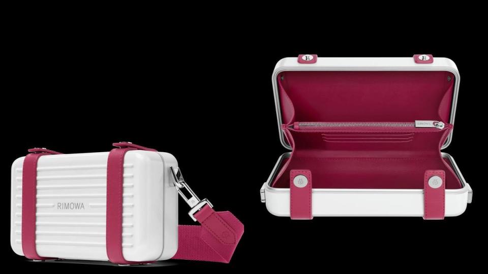 RIMOWA Personal Cross-body Raspberry覆盆子中性硬殼斜揹袋，內裡採用義大利全粒面皮革製成，有兩個開放式間隔、一個拉鏈間隔及三個卡片間隔。NT$44,700（美之心提供）