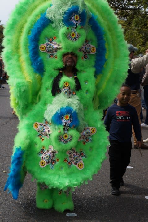 Mardi Gras Indians and revelers during the Uptown Super Sunday celebration in New Orleans (LeBron Joseph photo)