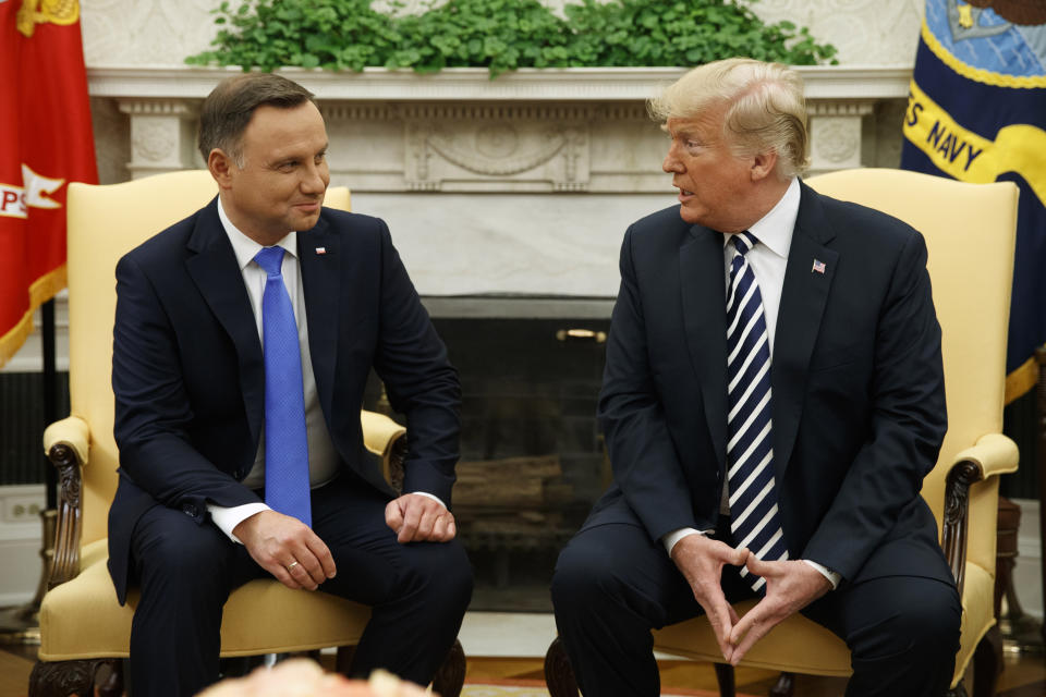 President Donald Trump talks with Polish President Andrzej Duda during a meeting in the Oval Office of the White House, Tuesday, Sept. 18, 2018, in Washington. (AP Photo/Evan Vucci)