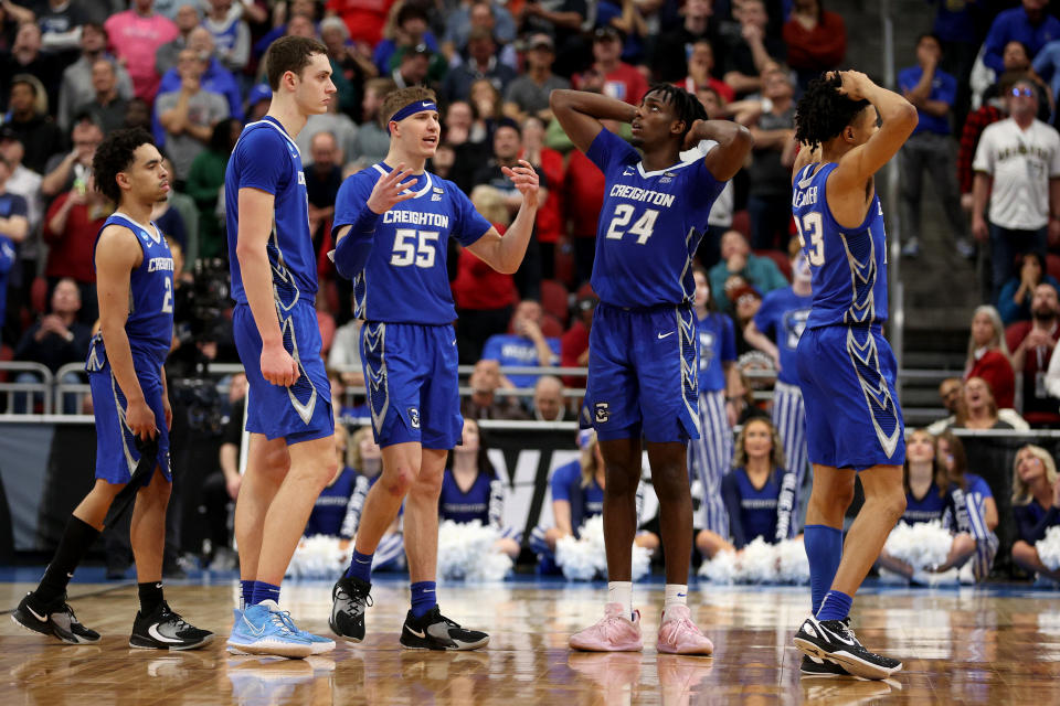 LOUISVILLE, KENTUCKY - MARCH 26: Ryan Nembhard #2, Ryan Kalkbrenner #11, Baylor Scheierman #55, Arthur Kaluma #24 and Trey Alexander #23 of the Creighton Bluejays reacts to a foul call against the San Diego State Aztecs during the second half in the Elite Eight round of the NCAA Men's Basketball Tournament at KFC YUM! Center on March 26, 2023 in Louisville, Kentucky. (Photo by Rob Carr/Getty Images)