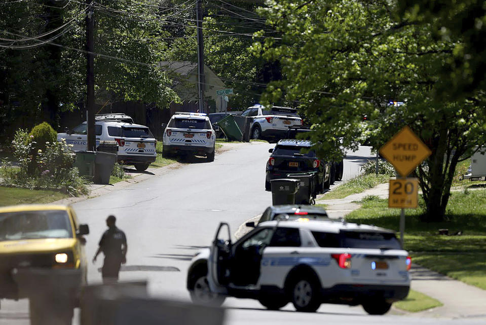 FILE - Police work at the scene of a shooting Monday, April 29, 2024, in east Charlotte, N.C. Police in North Carolina's largest city planned to update the public on the investigation into the fatal shootings of four law enforcement officers a month ago that occurred during an attempt to serve a warrant on a suspect in a residential neighborhood, Friday, May 31, 2024. (Khadejeh Nikouyeh/The Charlotte Observer via AP, File)