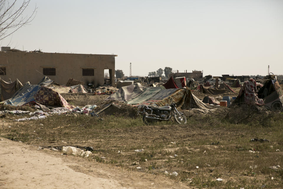 Tents are left behind by Islamic State group militants in Baghouz, Syria, as U.-S.-backed Syrian Democratic forces continued their push to oust IS fighters from their last territory, Monday, March 11, 2019. U.S.-backed Syrian forces made slow advances Monday into the edges of the last village held by IS, battling militants holed up in underground tunnels, a spokesman for the force said. (AP Photo/Maya Alleruzzo)