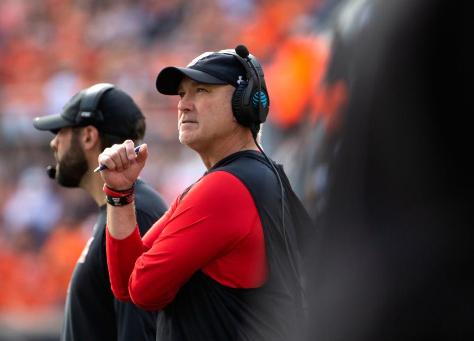 Texas Tech's head football coach Joey McGuire looks at the scoreboard against Oklahoma State in a Big 12 football game, Saturday, Oct. 7, 2022, Boone Pickens Stadium in Stillwater, Okla. 