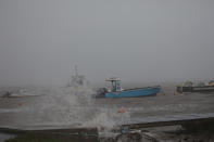 <p>Boats remain anchored in a wharf as Hurricane Maria approaches in Guadeloupe island, France, Sept. 18, 2017. (Photo: Andres Martinez Casares/Reuters) </p>