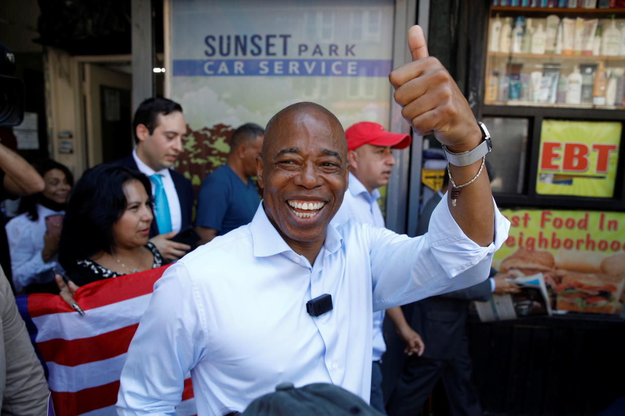 Eric Adams, Democratic candidate for New York City Mayor, greets a supporter while campaigning the Sunset Park neighborhood of Brooklyn, New York, U.S., June 15, 2021.  (Brendan McDermid/Reuters)