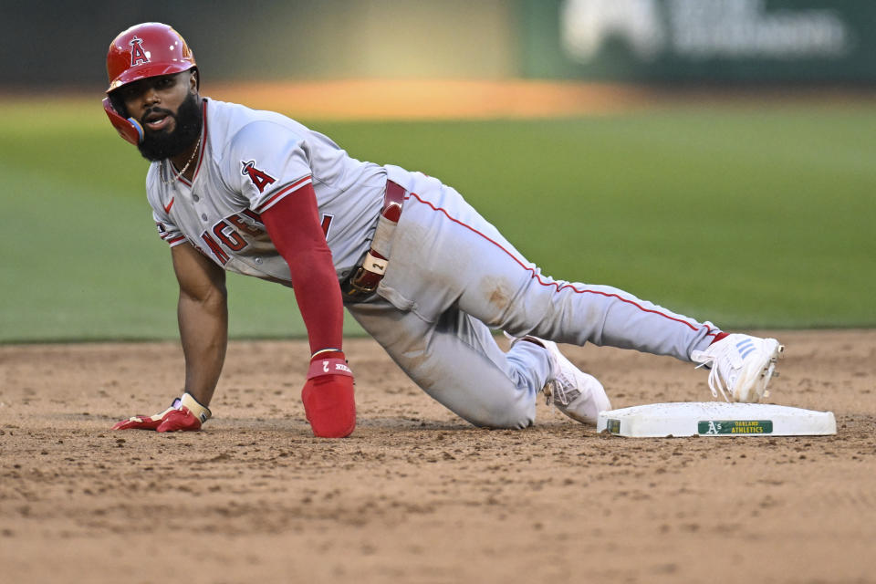 Los Angeles Angels third base Luis Rengifo (2) steals second base against the Oakland Athletics during the fifth inning of a baseball game Tuesday, July 2, 2024, in Oakland, Calif. (AP Photo/Eakin Howard)