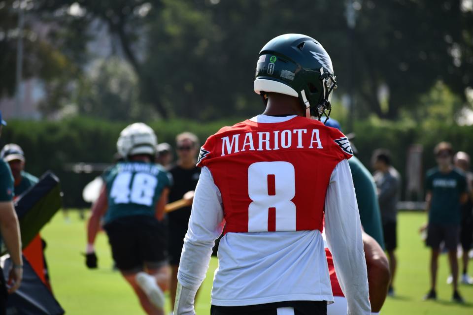 Philadelphia Eagles quarterback Marcus Mariota participates in his first training camp drills with the Eagles since signing with the team in March.